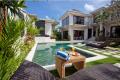 Bali Private Villa Resort Swimming pool with main villa in the back